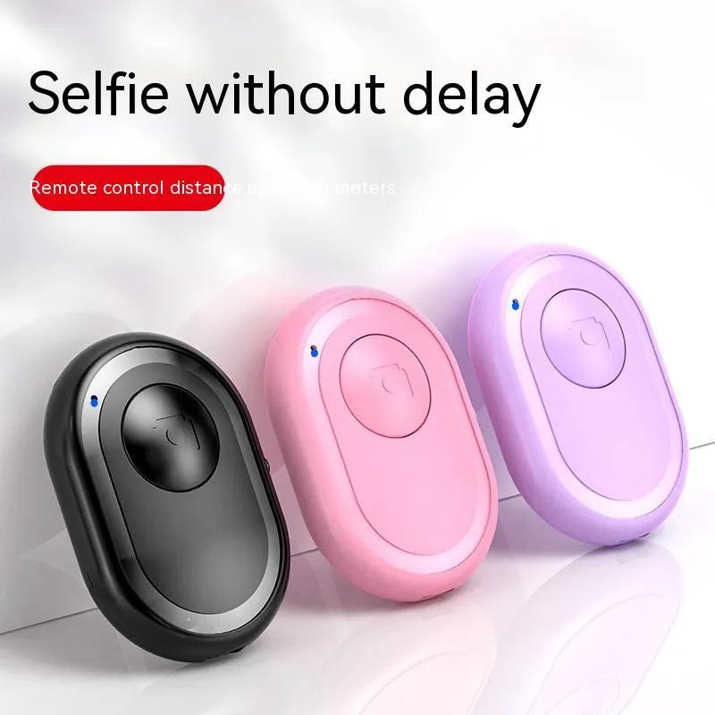 Compact black Bluetooth remote control for smartphone camera triggering