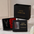 Six red soap flowers arranged in a black gift box with a matching handbag, a Valentine's Day gift set.