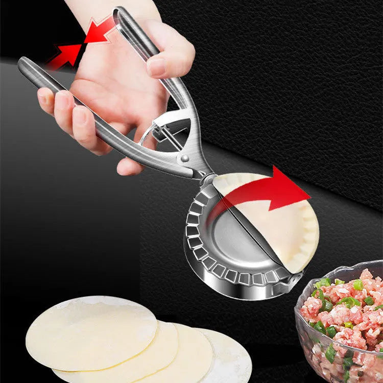 Silver stainless steel manual dumpling maker mould with handle for pressing and cutting wrappers.