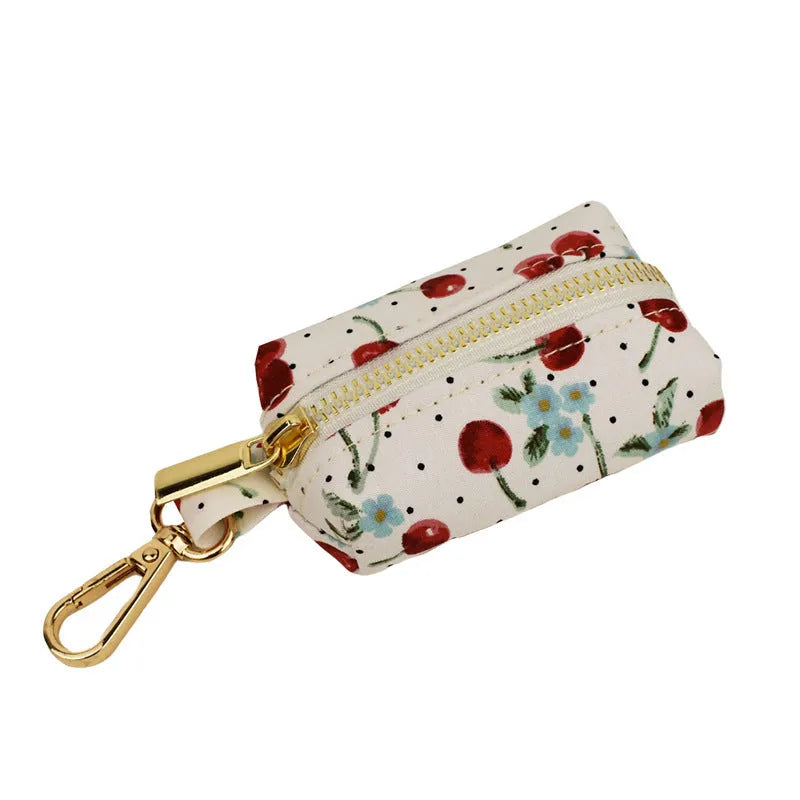 Red cherry printed dog collar set with leash, vest, poop bag, bow and light gold buckle