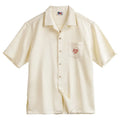 Light apricot men's shirt with bamboo and floral pattern and a Cuban collar