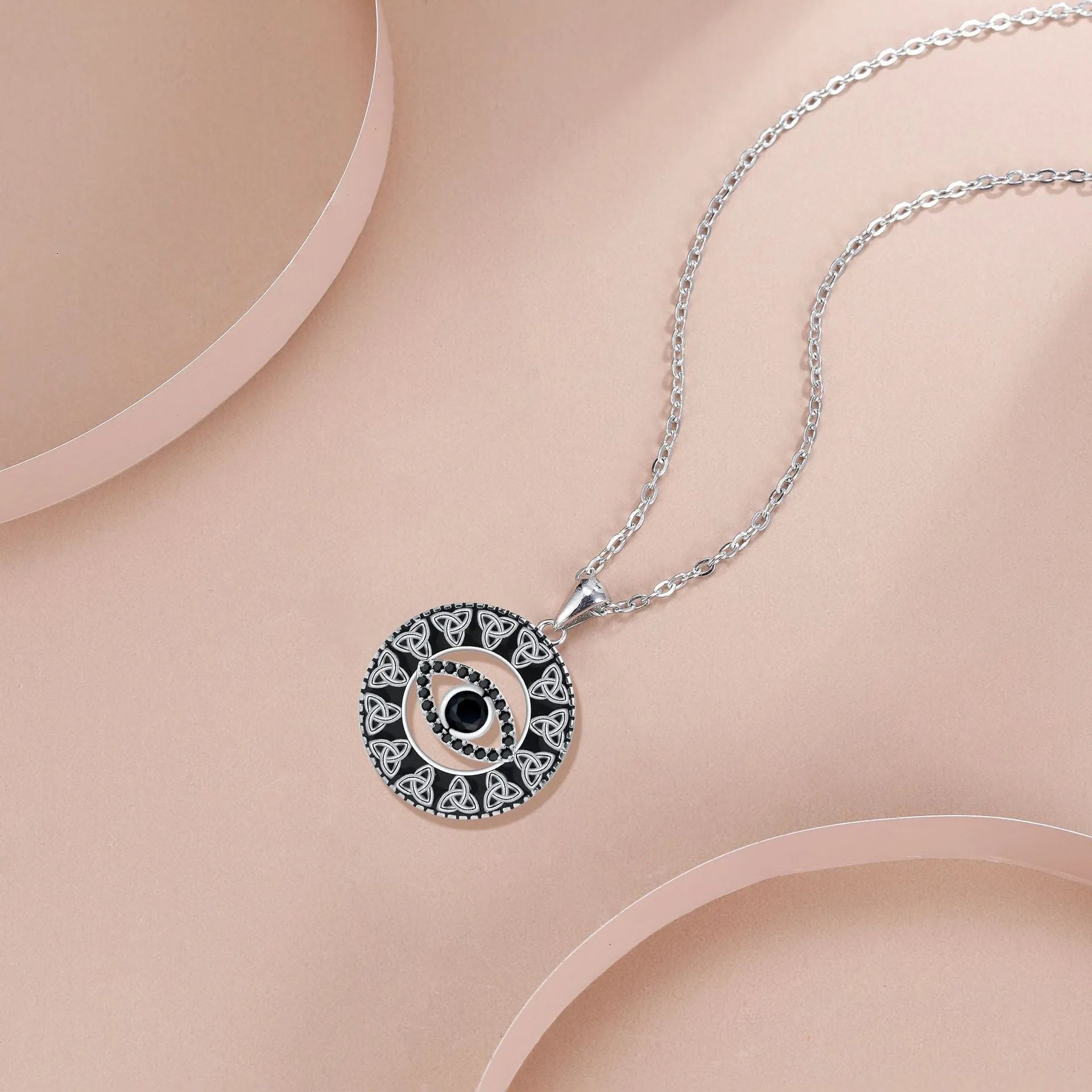 Copper electroplated Devil's Eye pendant necklace with a cross chain for women.