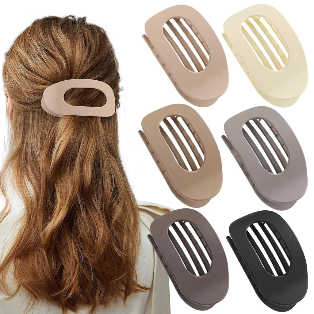 Six nude-coloured plastic hair clips with frosted grip and pointed toe design arranged on white background