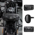 Black PU motorcycle pannier bag with punk retro styling mounted on a bike.