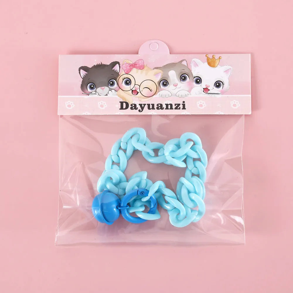 Plastic pet collar in macaron candy colours showing S and M sizes for cats, dogs, and rabbits