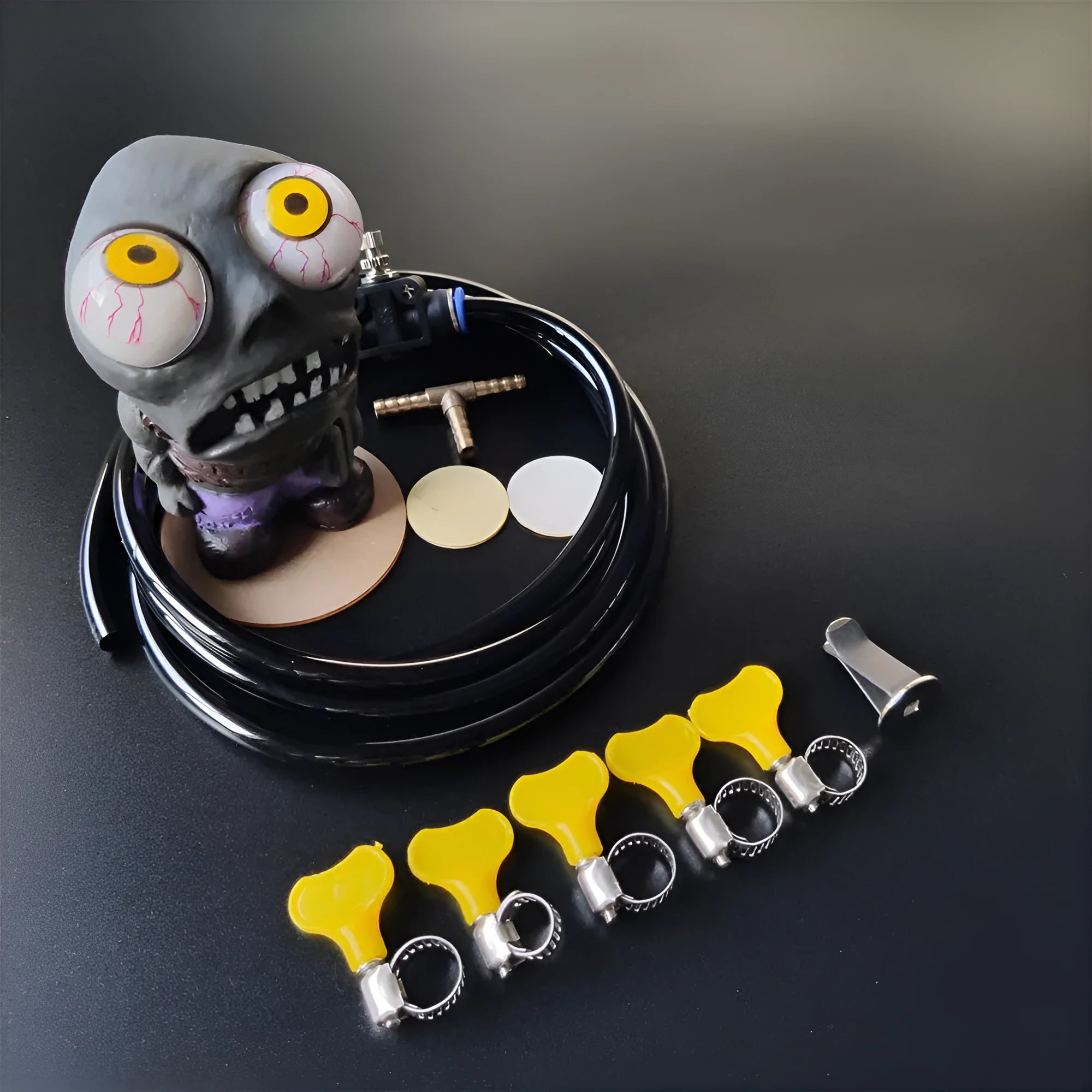 Turbo car decompress ornament kit with decorative doll, pressure regulating valve, and copper tubing