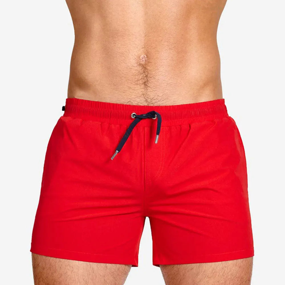 Men's solid colour polyester sports shorts with mesh lining in army green