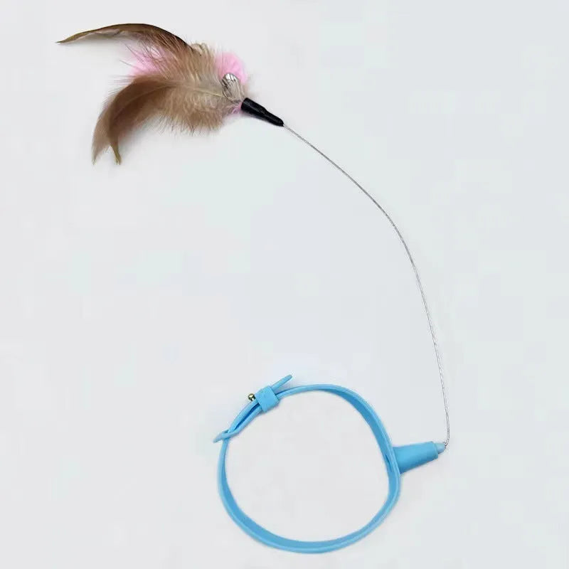 Blue adjustable cat collar with attached silicone wand, dangling feather, and a small bell for interactive play.