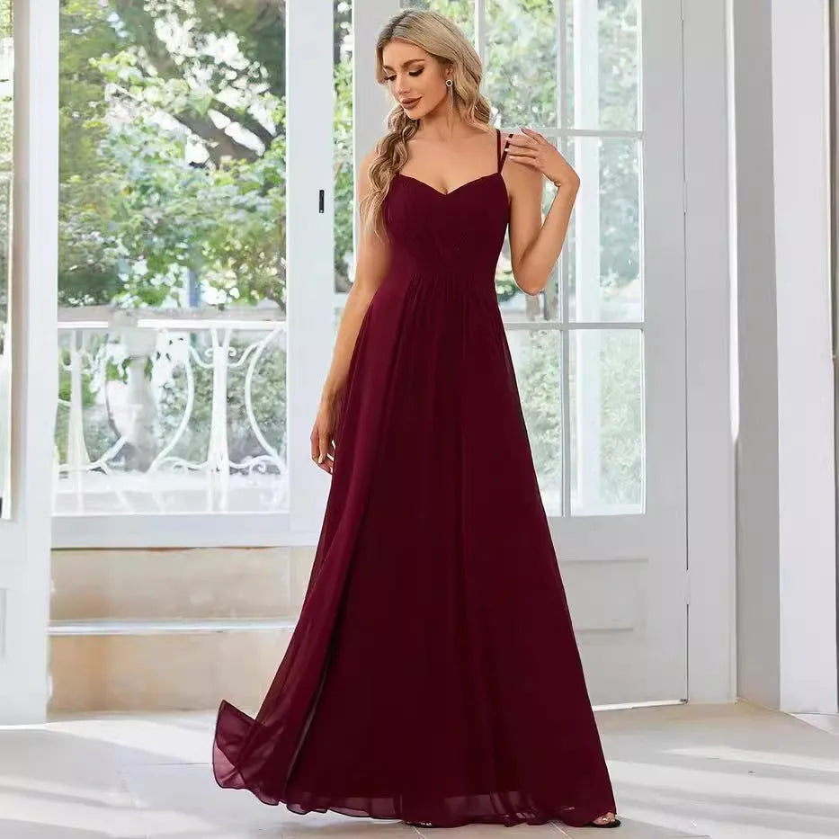 Women's sleeveless sling neckline banquet dress with long pleated A-line skirt