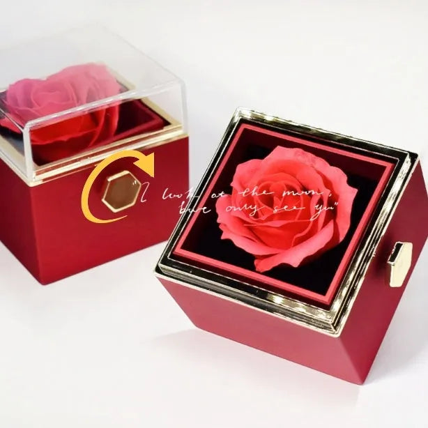 Rotating rose jewellery gift box with acrylic transparent cover showing preserved rose and rotating drawer open.