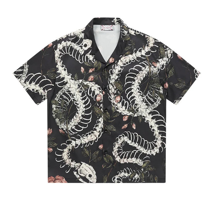 Original snake bone theme floral print on a loose, short sleeve Cuban collar shirt in assorted colours.