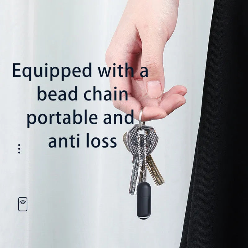 Black capsule-shaped infrared universal remote control emitter with Lightning, type-c, and micro-USB interfaces.