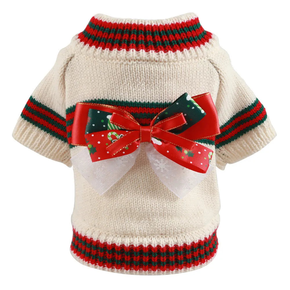 Red and green Christmas dog jumpers with festive print on a small dog model.