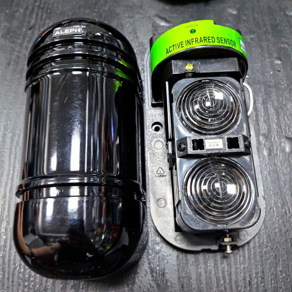 Black infrared anti-theft alarm detector with 2-beam 150 metre range for warehouse and community security