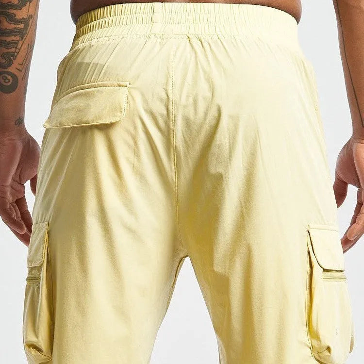 Men's black sports shorts with elastic waistband for running and gym workouts