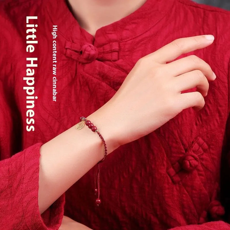 Cinnabar exam luck bracelet with braided rope strap and choice of bead or flower charm in ethnic style