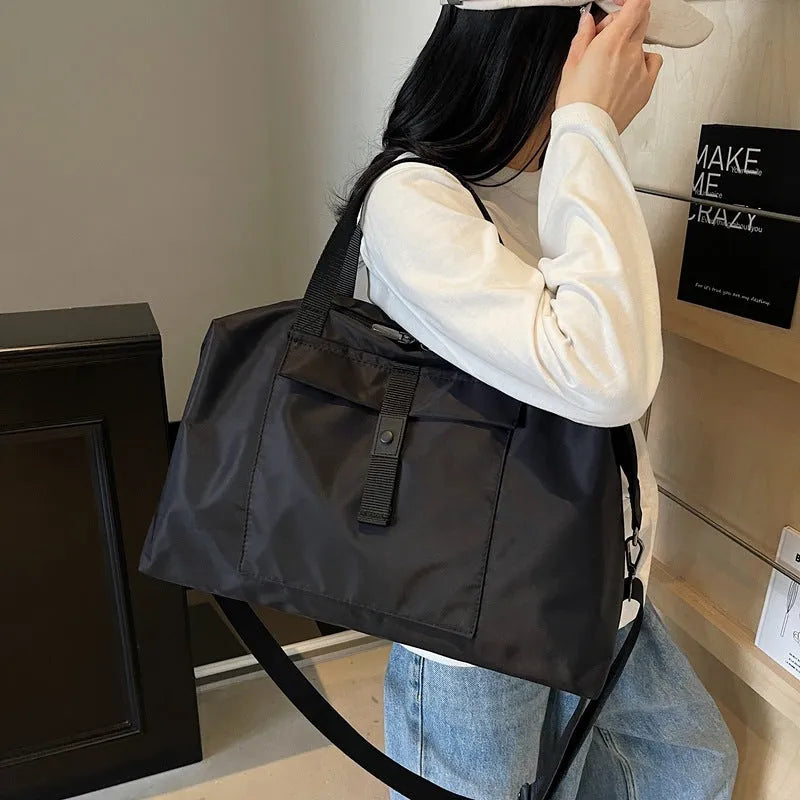 Large capacity one-shoulder travel backpack in Oxford cloth available in black, grey or green