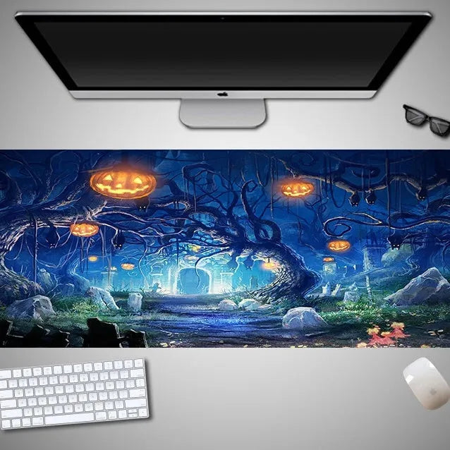 Oversized Halloween pattern rubber cloth mouse pad on a desk with non-slip base.