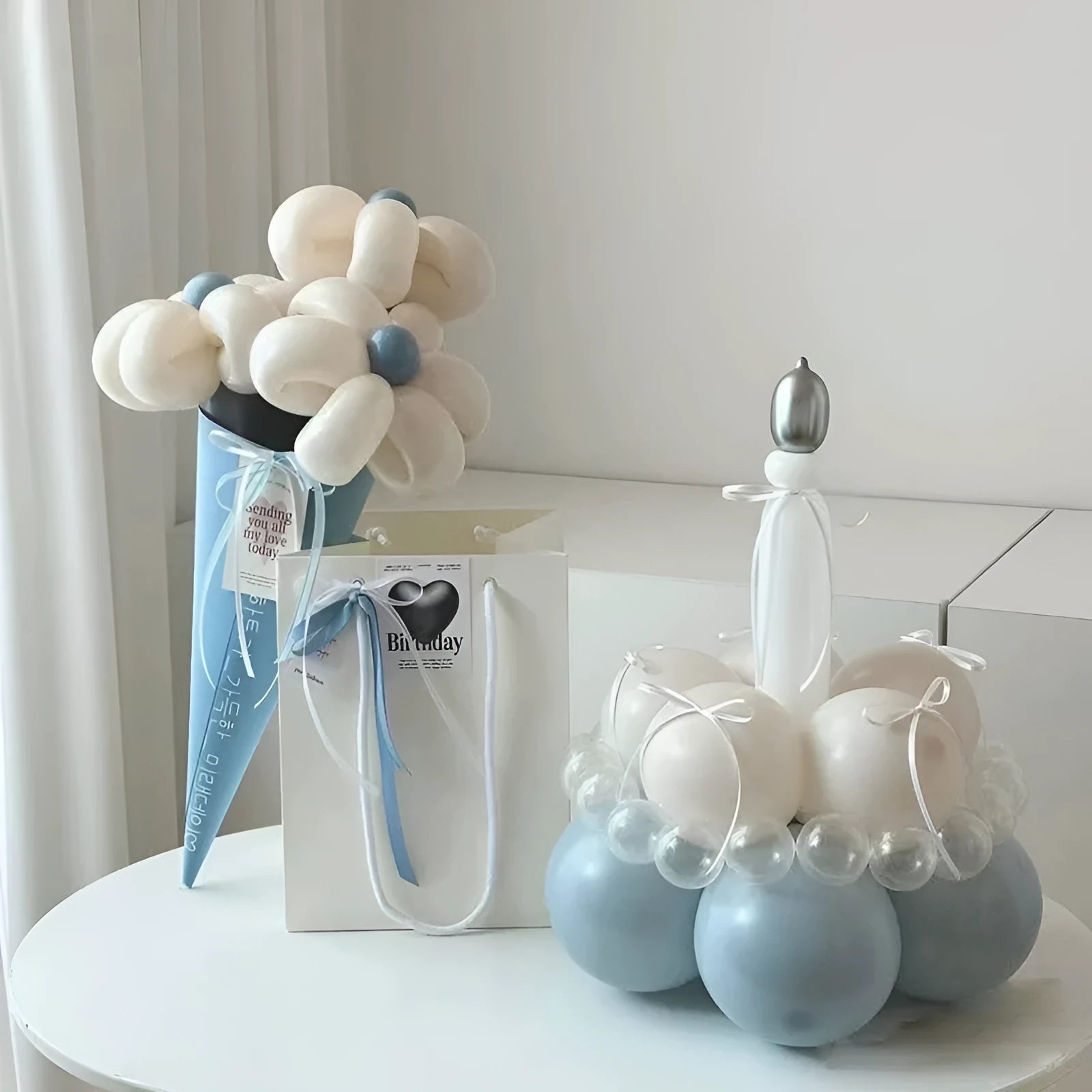 Round DIY balloon bouquet cake kit package for handmade party decoration.
