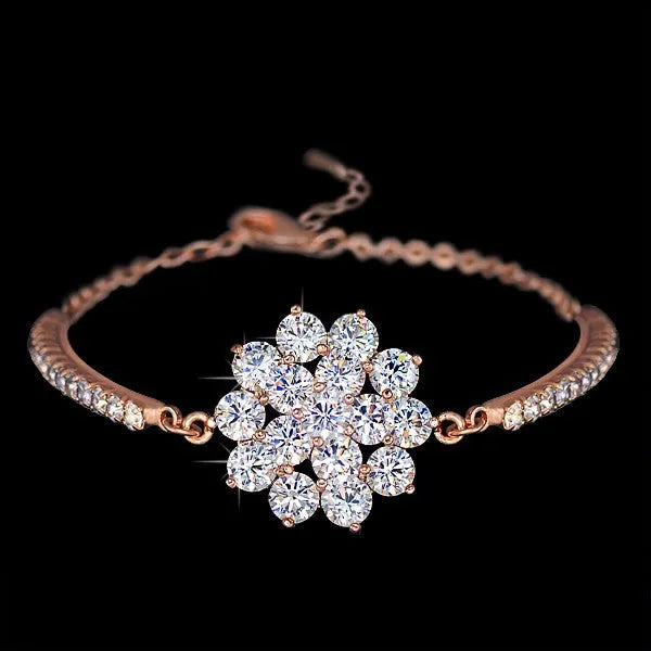 Rose gold cubic zirconia bracelet for women with adjustable 13-19cm length and cross, crown or Roman numeral design.