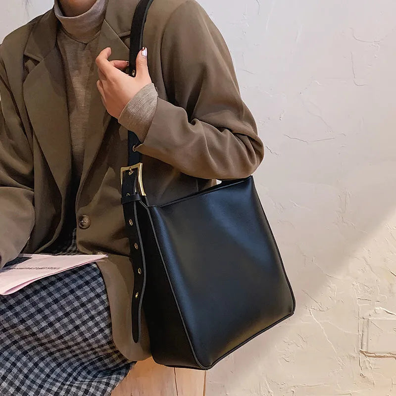 Women's soft PU shoulder messenger bag in black with sandwich zipper compartment, lightweight casual travel crossbody