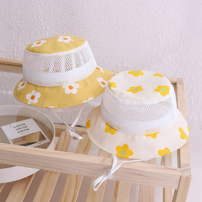 Floral baby bucket hat in mesh fabric, children cap for girls, available in blue, pink, white, and yellow