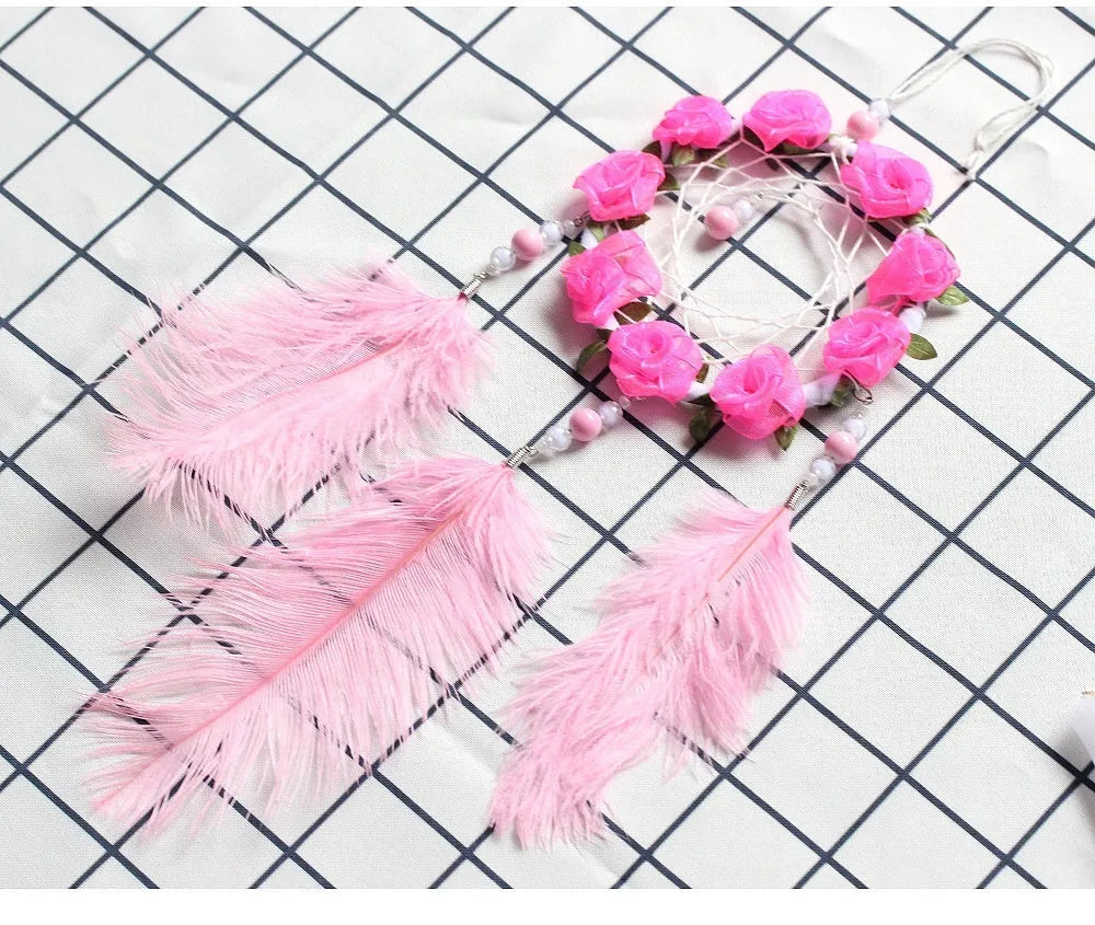 Pink dreamcatcher wind chime with ostrich feather ornaments, 10cm diameter wall decoration
