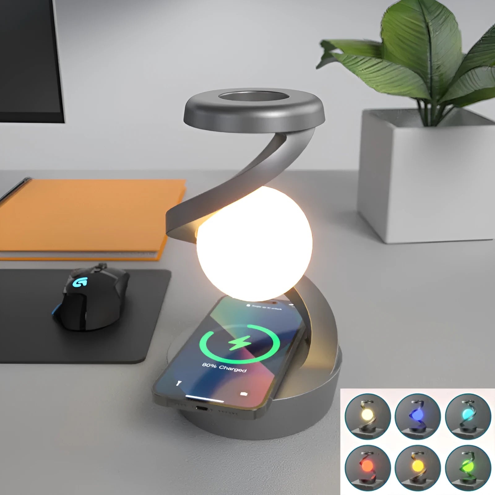 Rotating moon desk lamp with wireless charger in grey on a bedside table