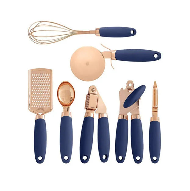 Seven-piece stainless steel kitchen tool set with copper handles on a cutlery rack, in rose gold colour.