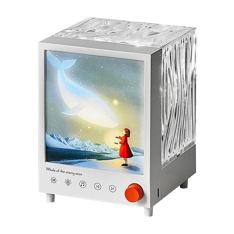 Aurora Treasure Box compact projection lamp showing Star Sea Whale light effect.