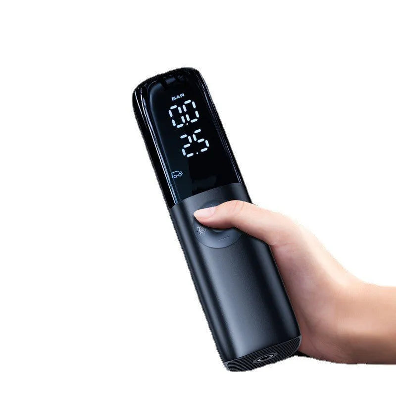 Black portable electric vehicle air pump with pressure gauge and inflation tube