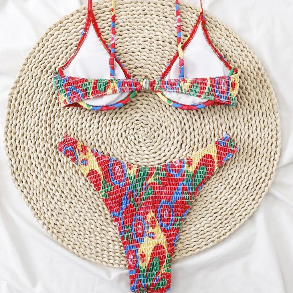 Red floral pattern women's underwire triangle bikini swimsuit with briefs, shown on a model.