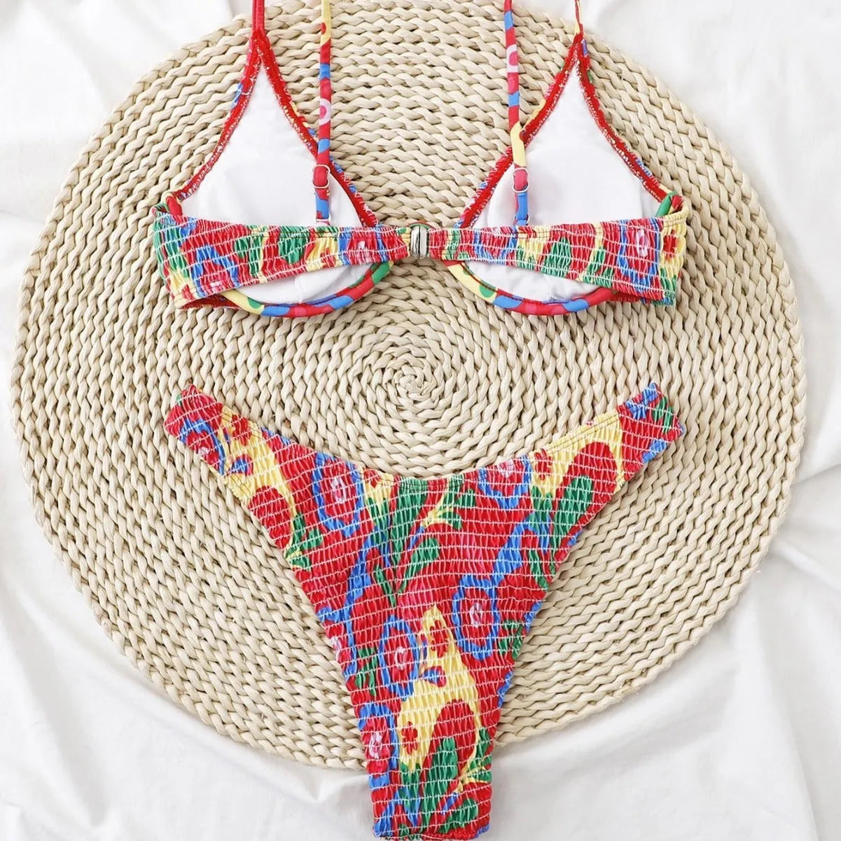 Red floral pattern women's underwire triangle bikini swimsuit with briefs, shown on a model.