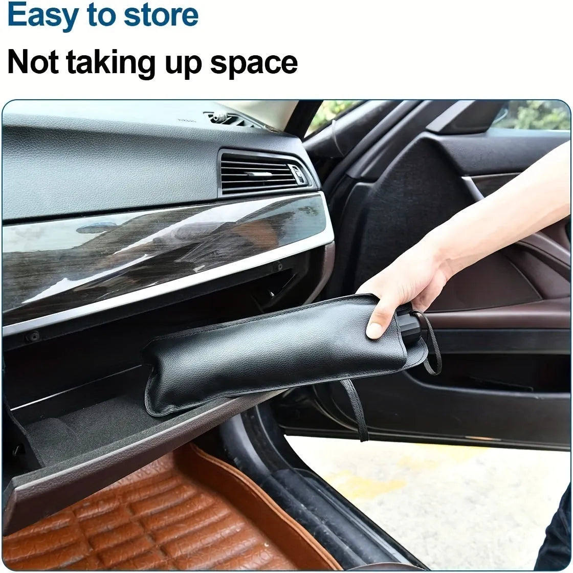 Foldable car windshield sunshade umbrella shown in open position against car windscreen