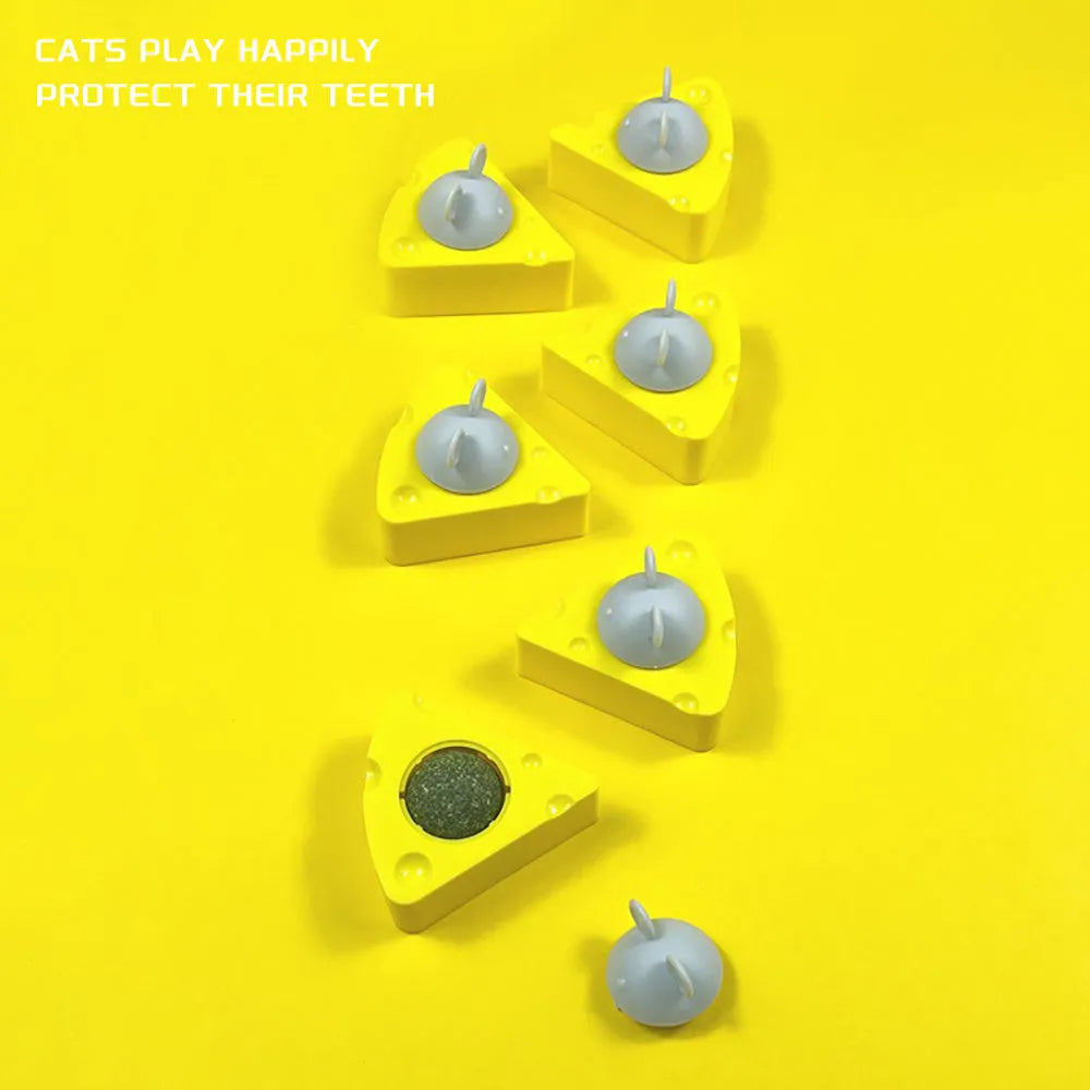 Yellow catnip and silvervine chew toy balls for indoor cats dental care