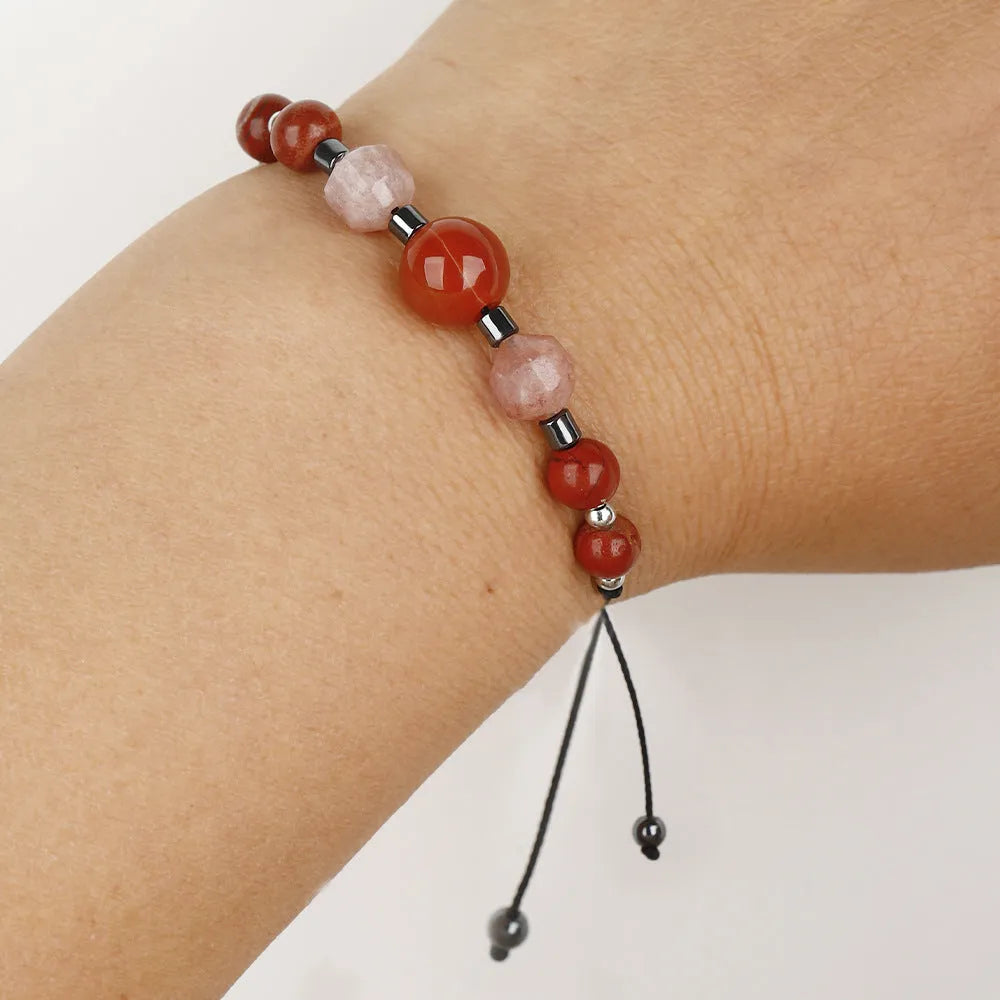 Red stone bracelet with sunstone, redstone and copper beads in geometric design