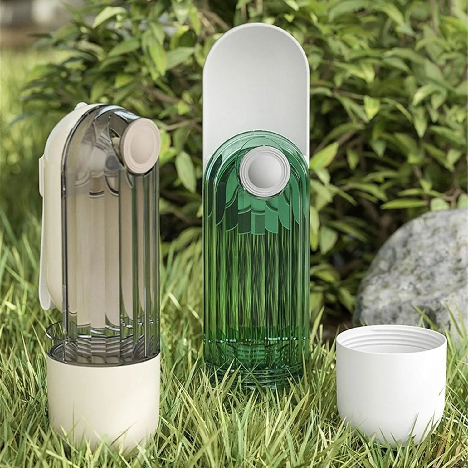 Beige and green portable dog water bottle with food dispenser, shown folded and unfolded.