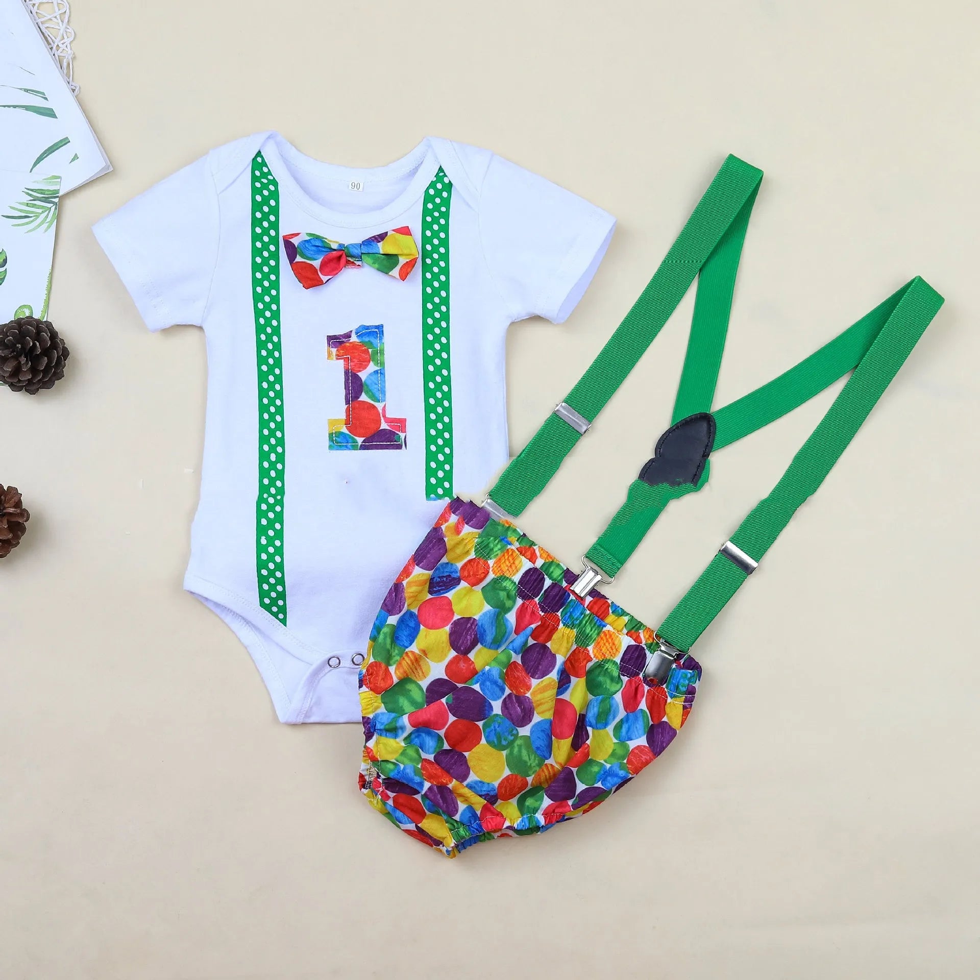 Cotton baby romper overalls in dinosaur print or dot patterns with shorts length and decorative straps