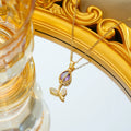 Gold tone zircon tulip pendant necklace on a model, showing the adjustable O-ring chain.