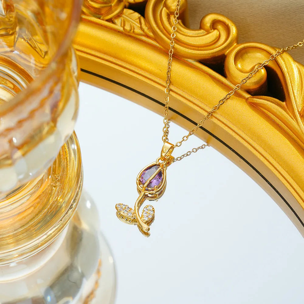 Gold tone zircon tulip pendant necklace on a model, showing the adjustable O-ring chain.