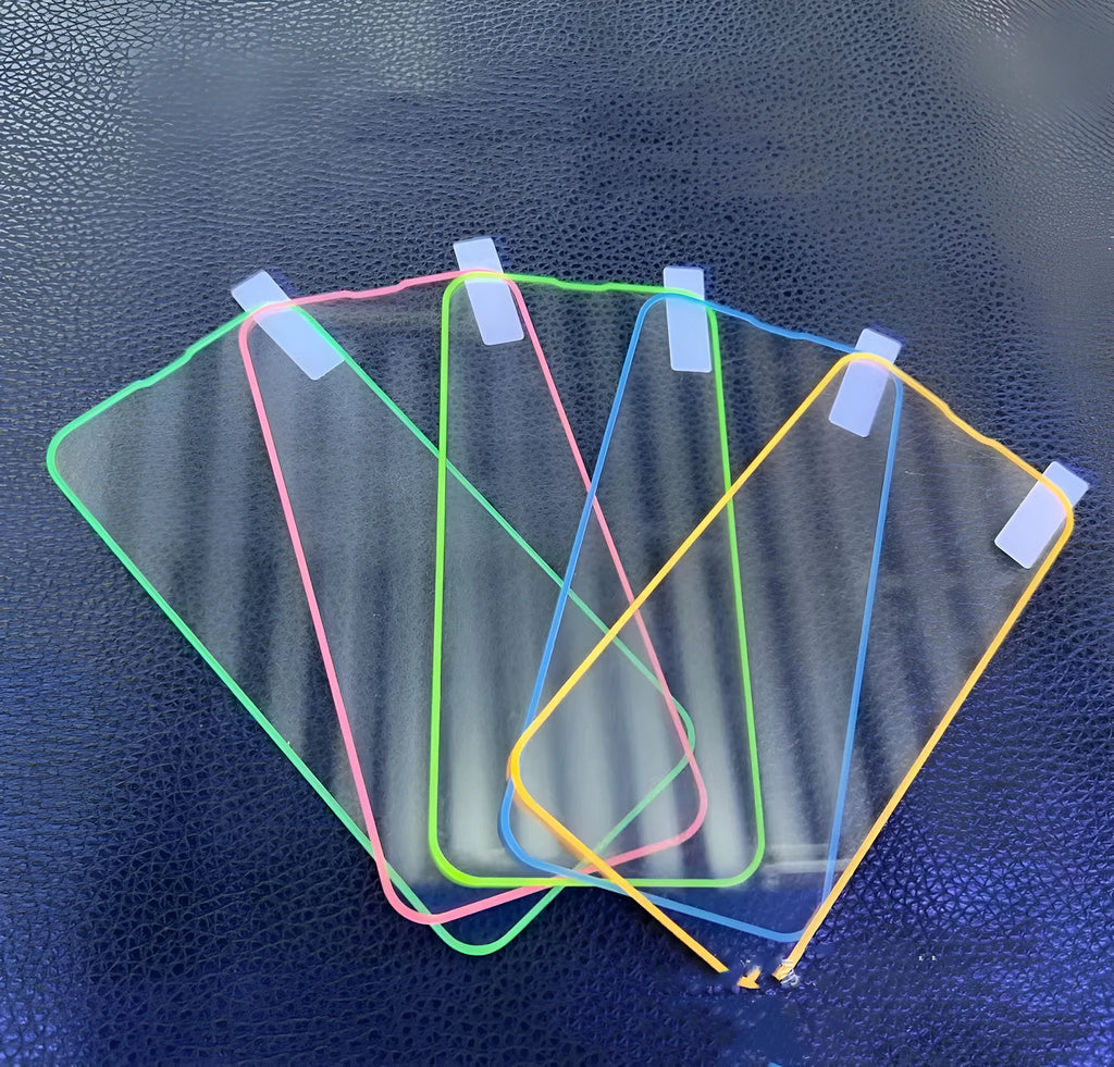 Luminous pink tempered glass screen protector fitted on an iPhone, showing full screen coverage and glow.