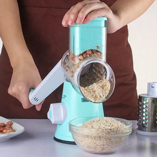 Blue manual round mandoline vegetable and cheese slicer with stainless steel blades.