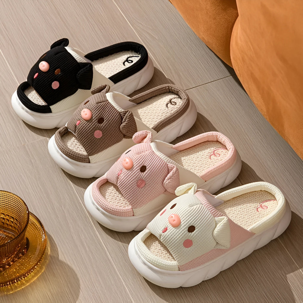Pair of open-toe linen flip-flop slippers for couples on a plain background, showing colours and strap detail.
