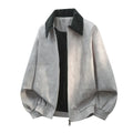 Men's stitching lapel casual jacket in dark colour, showing side seam pockets and straight hem.