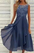 Women's sleeveless green chiffon dress with lace embroidery and a mid-length flowy skirt.