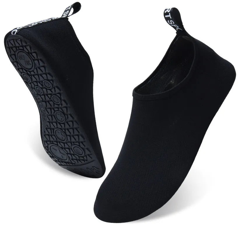 Non-slip water shoes with elastic band and mesh upper in Snowflake Mesh blue pattern.