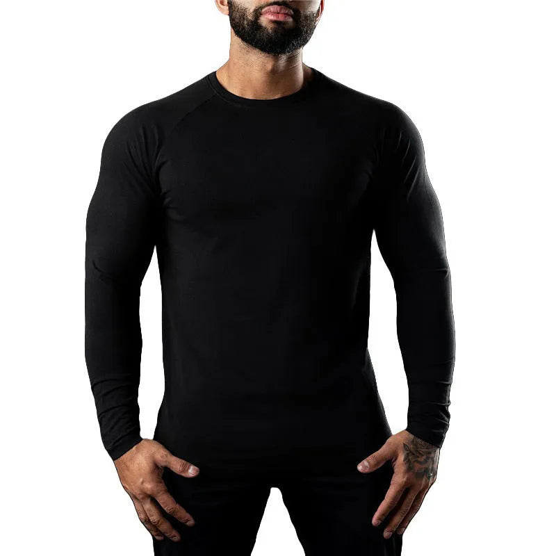Men's fitted long sleeve cotton sports t-shirt in Army Green, shown on a model.