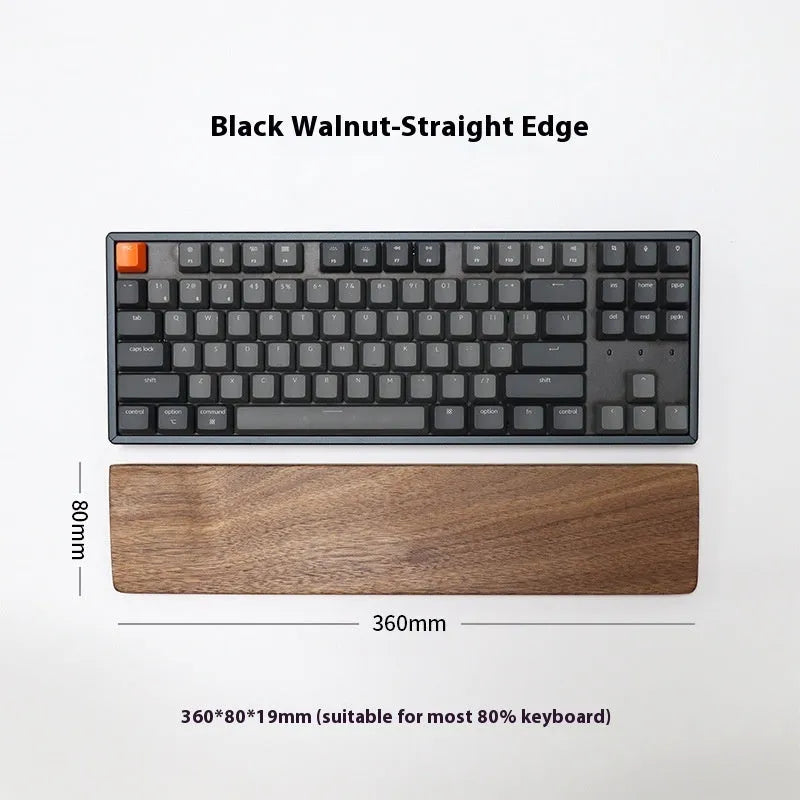 Black walnut wooden keyboard palm rest with wrist strap, 440mm long, on a desk