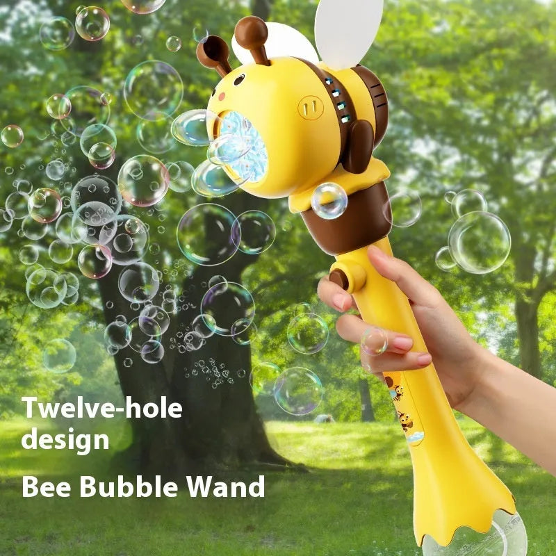 Yellow electric bee bubble machine toy with automatic lights on a flat surface