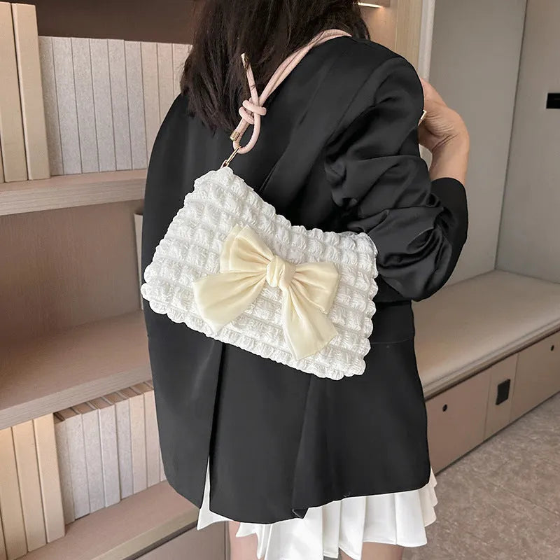 Women's canvas one-shoulder handbag in horizontal square shape with sandwich pocket design